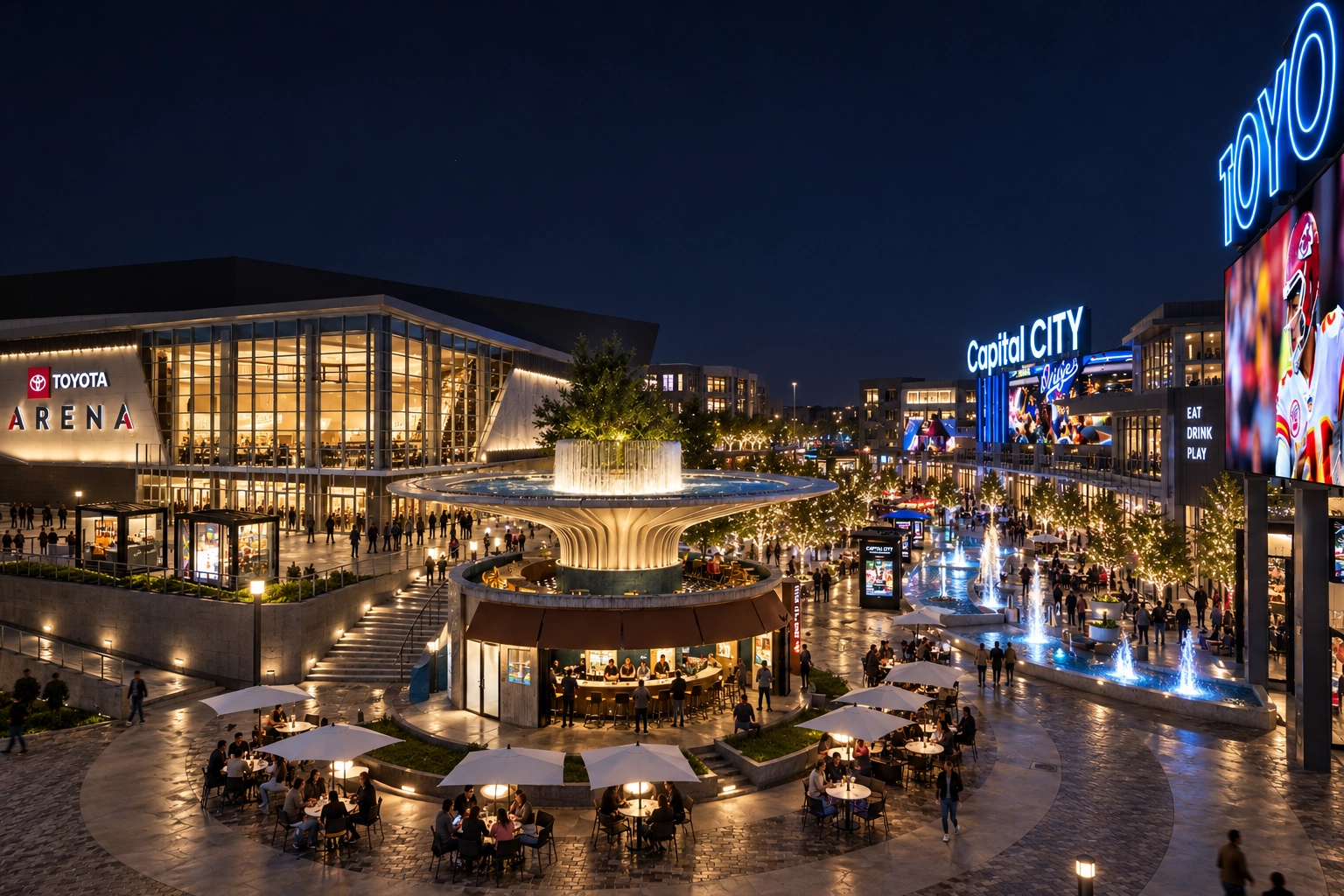 The Plaza at night from above, fountains and screens lit